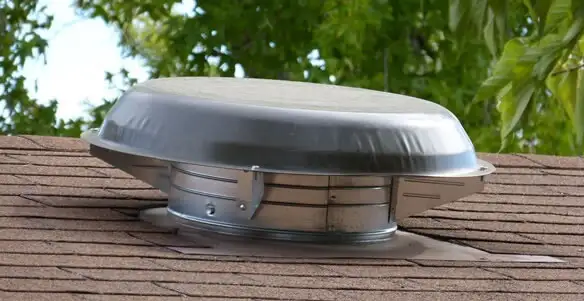 attic fan installation services with low-profile roof ventilation unit in Olathe, KS