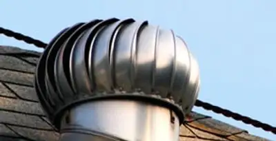 attic fan installation services with professionally installed roof ventilation unit in Olathe, KS