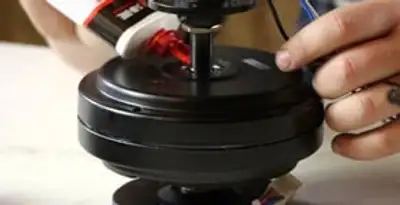 Ceiling fan motor repair and internal component adjustment in Olathe, KS