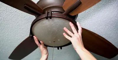 Ceiling fan repair and reinstallation on ceiling mount in Olathe, KS