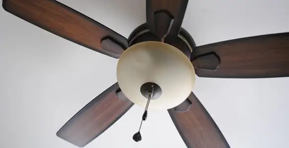 Fully installed ceiling fan with balanced blades and light fixture in Olathe, KS
