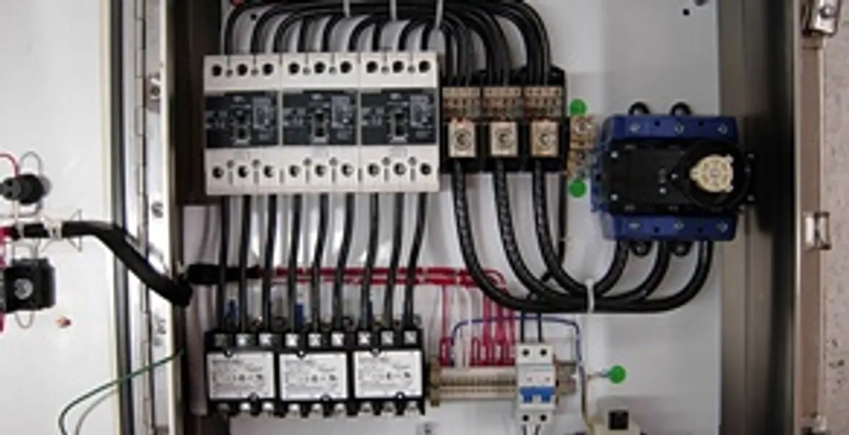 Electrical panel installation with organized circuit breakers and wiring in Olathe, KS