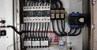 Electrical panel installation with organized circuit breakers and wiring in Olathe, KS