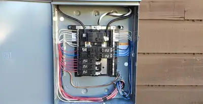 electrical panel upgrade service featuring newly installed electrical panel wired by licensed electricians in Olathe, KS