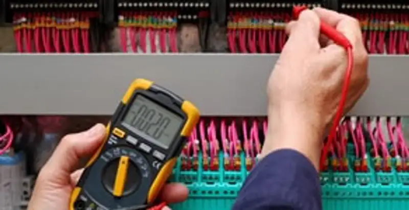 electrical service showing professional testing and troubleshooting of electrical panel by licensed electricians in Olathe, KS