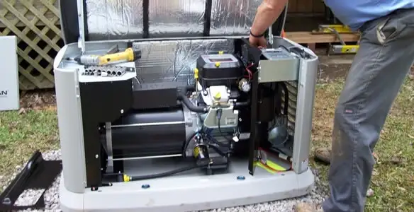 generator installation service showing technician connecting and configuring generator components in Olathe, KS