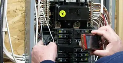 Home electrical inspection of circuit breaker panel by licensed electrician in Olathe, KS