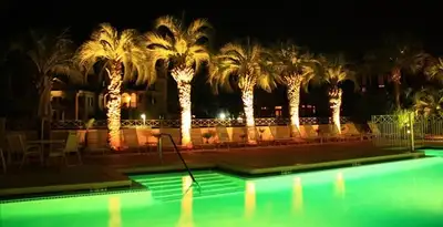 landscape lighting installation services illuminating outdoor recreational areas in Olathe, KS