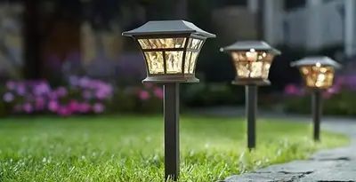 landscape lighting installation services with professionally installed pathway lights in Olathe, KS