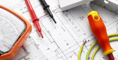 licensed electrician planning and testing electrical systems using professional tools in Olathe, KS