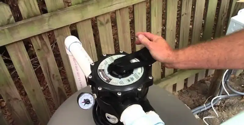 pool pumps service showing professional adjustment of pool pump control system in Olathe, KS