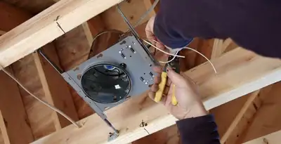 Professional recessed lighting installation with electrical wiring by licensed electricians in Olathe, KS