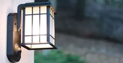 security light installation services with professionally mounted exterior wall light in Olathe, KS