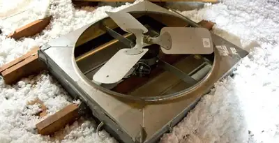 whole house fan installation services with attic-mounted ventilation unit in Olathe, KS